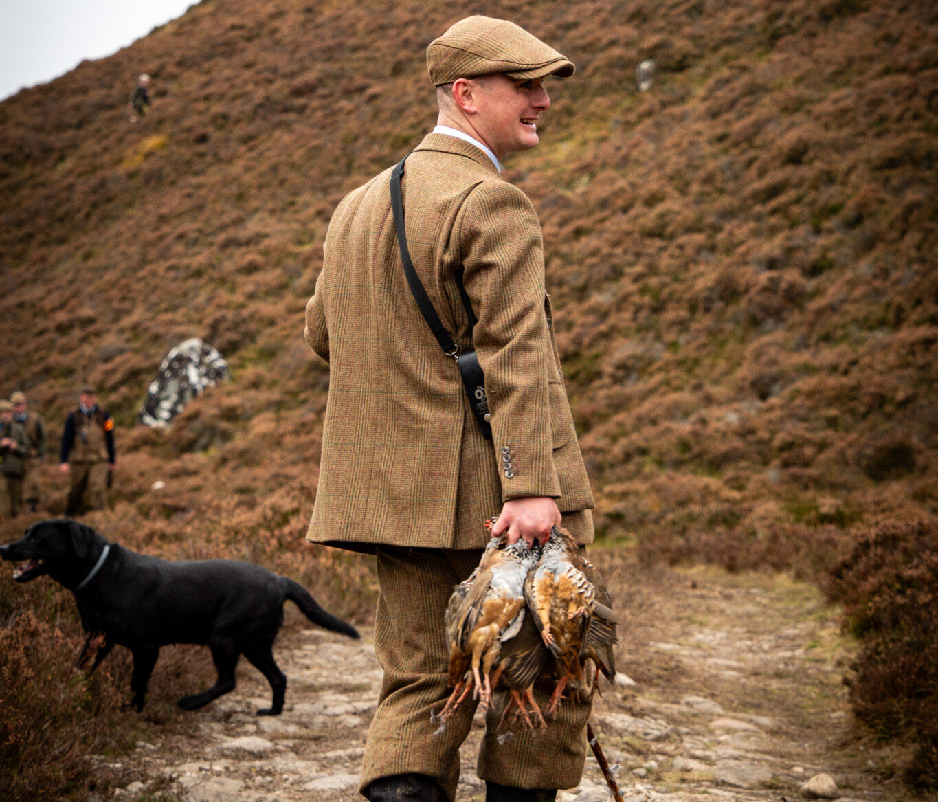 Ben Alder Estate's Head of Game carries some of the spoils of a traditional country sport, the Low-Ground-Shoot.