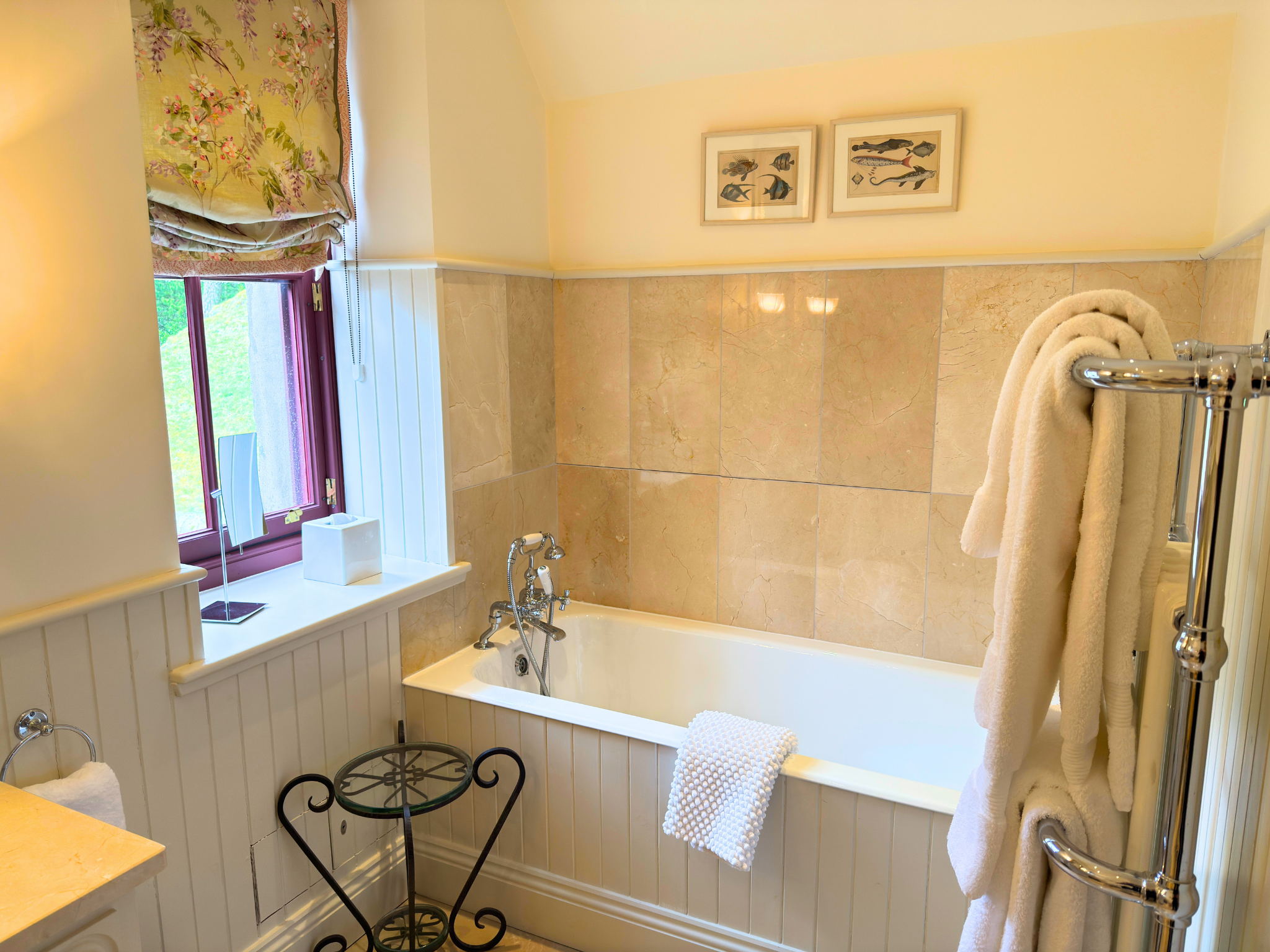A bath in an ensuite bathroom in Dalnaspidal Lodge (Ben Alder Estate).