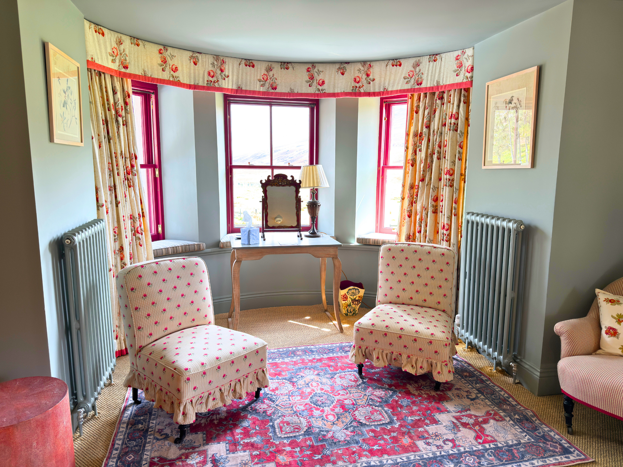 A comfortable dressing area in a king-size bedroom in Dalnaspidal Lodge (Ben Alder Estate).