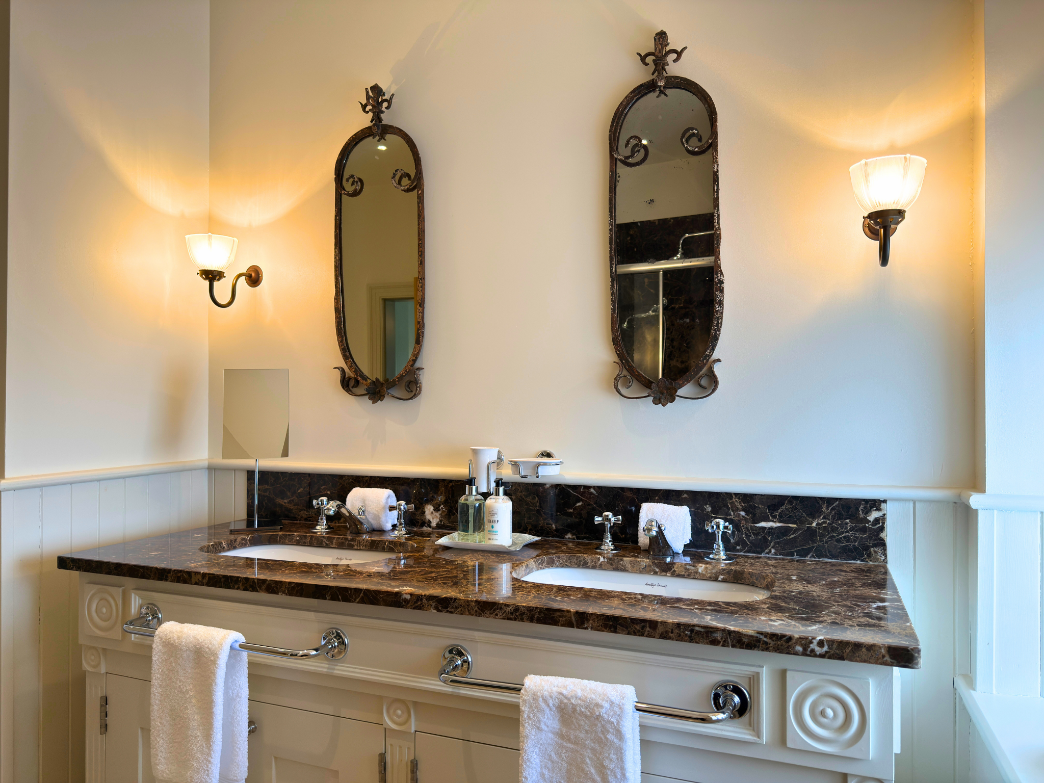 A marble-topped sink area in an en-suite bathroom in Dalnaspidal Lodge (Ben Alder Estate).
