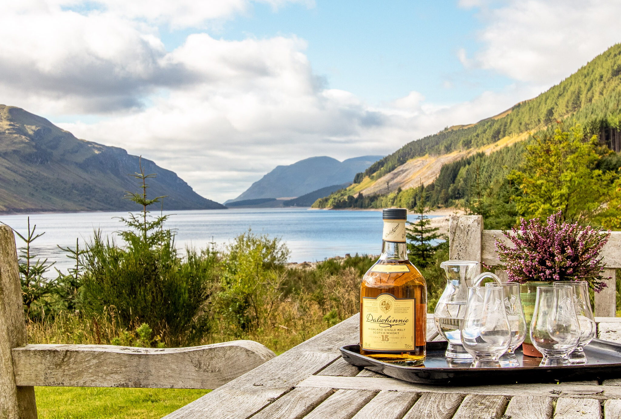 A refreshing tipple looking out on the shores of Loch Ericht at An-Tochailt Lodge.